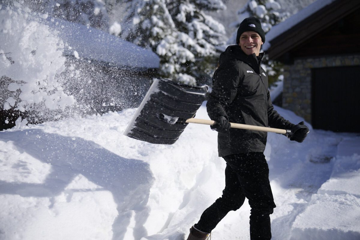 Ski basics chalet host / driver snow clearing outside catered ski chalet, chalet hermine in Meribel Village